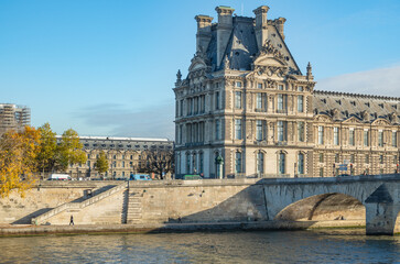 Fototapeta na wymiar the facade of the classic european building in paris view of the museum of louvre