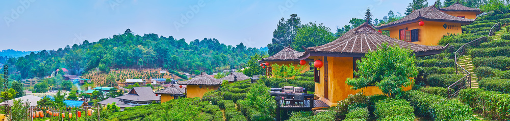 Sticker The slope with tea shrubs and houses, Ban Rak Thai Yunnan tea village, Thailand