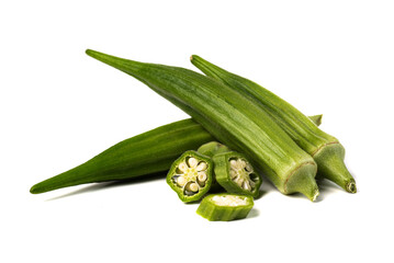 Green fresh okra. Whole pods and pieces on  white background.