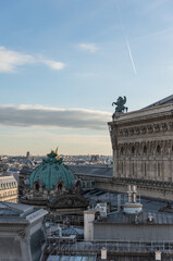 Music on top of Opera Garnier Winged golden statues atop the paris opera house paris