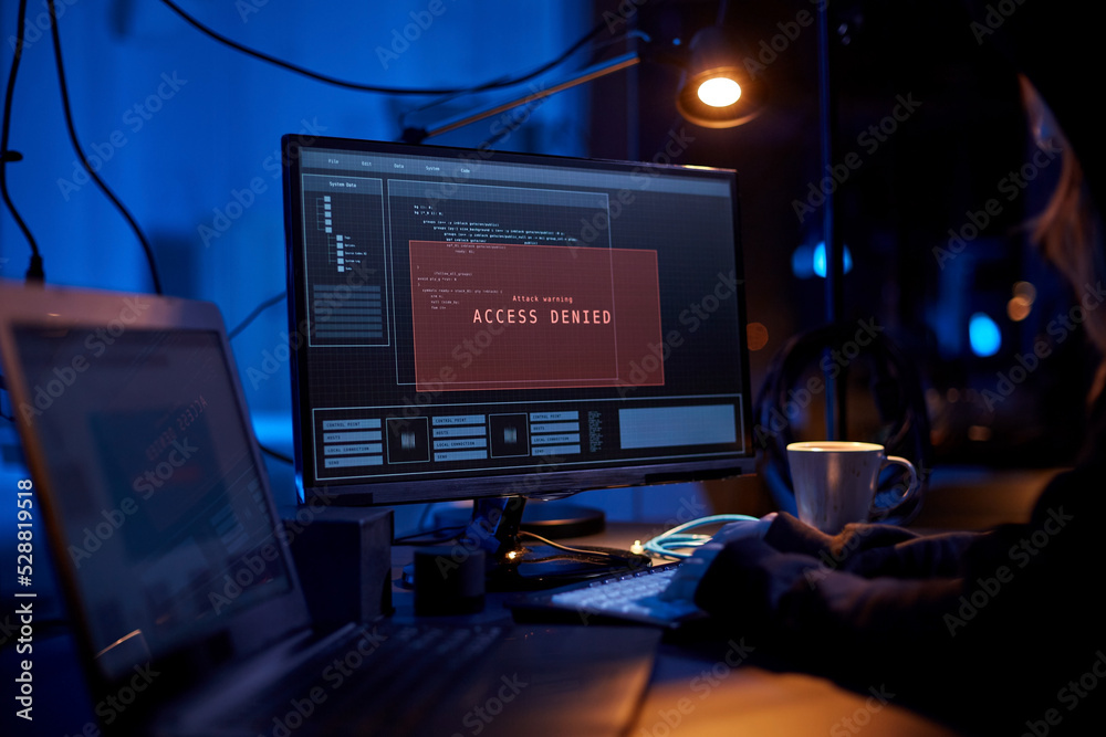 Poster cybercrime, hacking and technology concept - close up of female hacker in dark room breaking securit