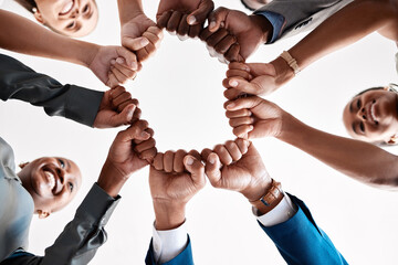 Hands, collaboration and motivation with a business team in a huddle with fists and a mindset of...