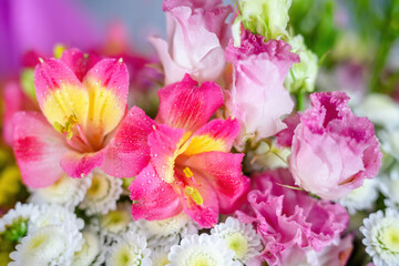Fototapeta premium Natural background with an alstroemeria and lisianthus