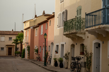Colorful houses in Port Grimaud, village on Mediterranean sea with yacht harbour, Provence, France