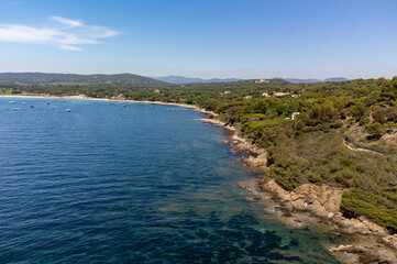 Aerial view of legendary Pampelonne beach near Saint-Tropez, summer vacation on white sandy beaches of French Riviera, France