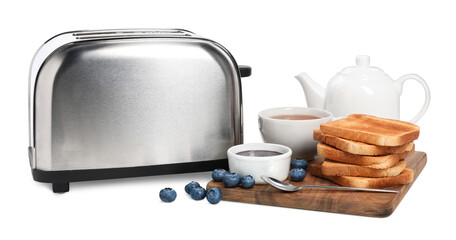 Toaster, bread with jam, blueberries and tea on white background