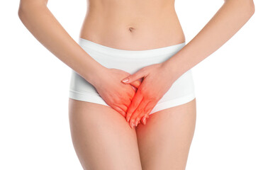 Woman suffering from vaginal yeast infection on white background, closeup