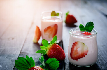 Healthy food of yogurt, Strawberry Yogurt,yogurt with fresh strawberry, wood background