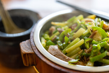 angle view fast food of fried pork and fish with celery with bowl of soup horizontal composition