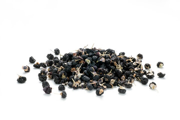 Heap of black Chinese wolfberry isolated on white background