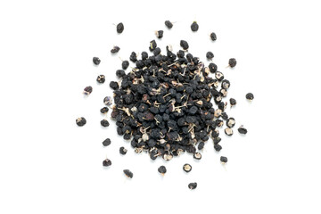 Heap of black Chinese wolfberry isolated on white background