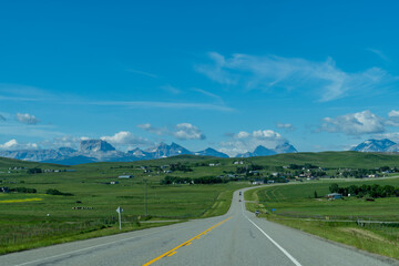 View of the mountains in Waterton Lakes National Park, as seen from nearby small towns on Alberta Highway 5