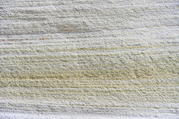 Erosion in sandstone rock cliff, patterns and textures in nature as a background
