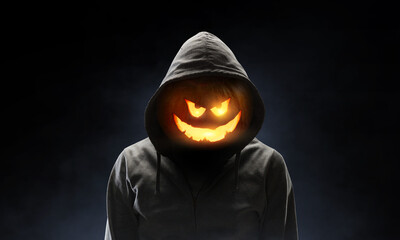 Scary and creepy male monster with gouged eyes looking like a skull