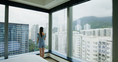 Fototapeta premium Woman look at the city view