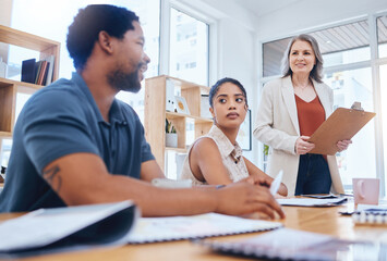Training, workshop and coaching with a female leader, manager or boss in a meeting with a business...
