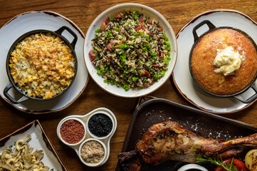 Set of food with meat, rice, souffle and creamed corn