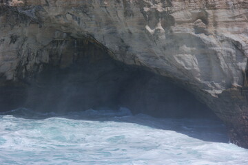 Sea waves greets the rocks at the beach