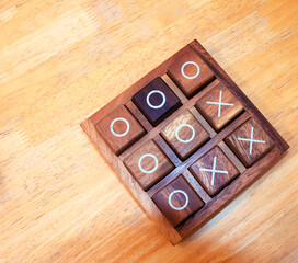 tic tac toe XO game,Wood Toys,warm light and vintage effect.