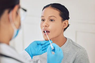 Female patient, healthcare and covid test using swab in mouth to collect specimen at testing...