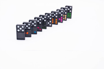 Colourful dominoes in a row. Concept creative, logical thinking.