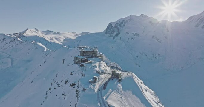 Aerial drone flyover Gornergrat with Matterhorn view during winter in Switzerland. Majestic mountain peaks iconic famous zermatt travel ski resort in the alps. Wonderful inspiring nature landscape.