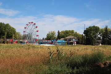 Fototapeta na wymiar Field And Midway, Fort Edmonton Park, Edmonton, Alberta