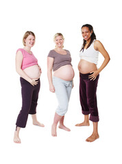 Portrait of happy pregnant, woman and friends in a group photo over white studio background. Female people in diversity smile with baby bumps or belly standing in happiness to be a mother in mockup.