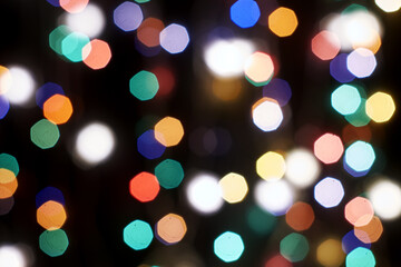 multicolored festive lights on a black background screensaver backdrop