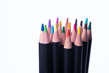 Tip of pencil set with various colors arranged together. 