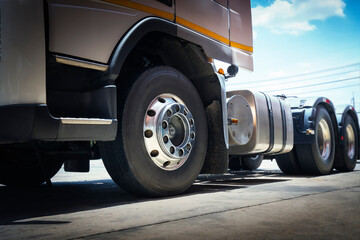 Semi Truck on Parking. Truck Wheels Tires. Rubber, Truck Tyres. Freight Trucks Transport Logistics. Auto Service Shop. 