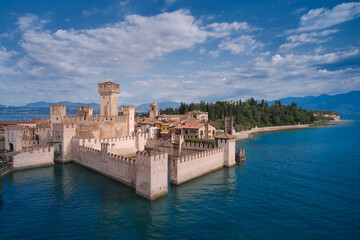 Rocca Scaligera Castle in Sirmione Lake Garda Italy. Aerial view. Italian castle on Lake Garda. Aerial panorama of Sirmione.