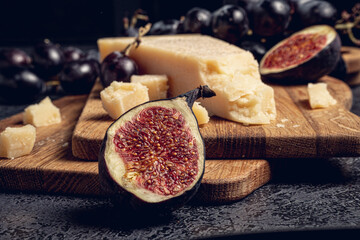 Parmigiano Reggiano the most popular cheese whith fruits , honey and figs