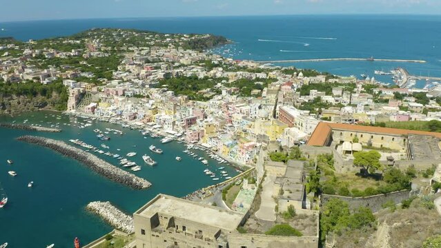 Cinematic Aerial View Above Procida, Italy. Typical Island Town on Beautiful Summer Day off the Coast of Napoli (Naples)