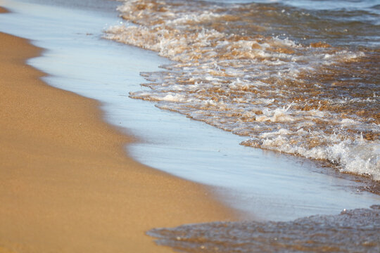 Waves on the sandy seashore