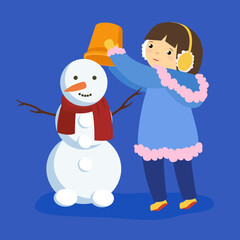 girl puts a bucket on the snowman's head