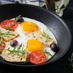 Fried egg, meatloaf, and tomatoes. Keto, paleo breakfast.