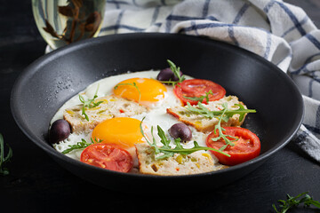 Fried egg, meatloaf, and tomatoes. Keto, paleo breakfast.
