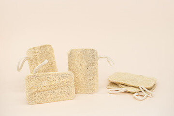 Fototapeta na wymiar Ecological loofah sponges, biodegradable scrub pad. Zero waste household product.