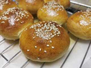 buns with sesame seeds on a plate