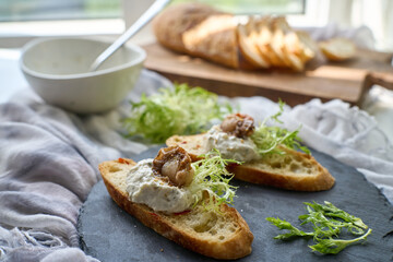 delicious toast, topped with clam meat, endive and yogurt