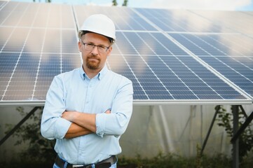 technician checks the maintenance of the solar panels