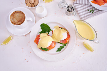Eggs Benedict with Cream cheese and Smoked salmon on a plate