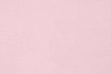 Saturated pastel light pink colored low contrast Concrete textured background. Empty colourful wall texture with copy space for text overlay and mockups. 2023, 2024 color trend