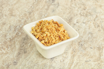 Crunched roasted peanut in the bowl