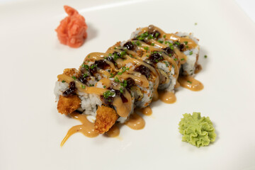 Sushi serving on white plate