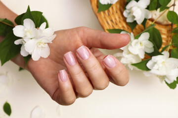 Obraz na płótnie Canvas Classic manicure with a shiny top coat for nails.