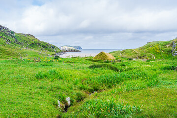 Bosta (Bostadh) Iron Age House covered with grass - Isle Of Lewis, Scotland