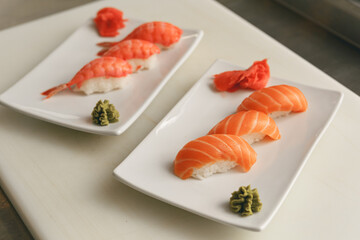 Traditional Japanese cuisine. Fresh made Sushi with salmon and shrimps