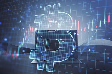 Close up of laptop with glowing digital bitcoin hologram and lines on blurry background. Cryptocurrency, online banking, app and finance concept. Double exposure.